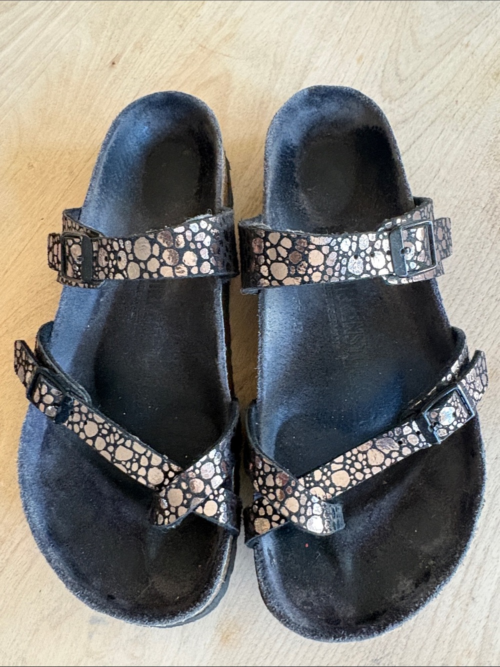 Birkenstock Black Sandals with Metallic Rose Accents